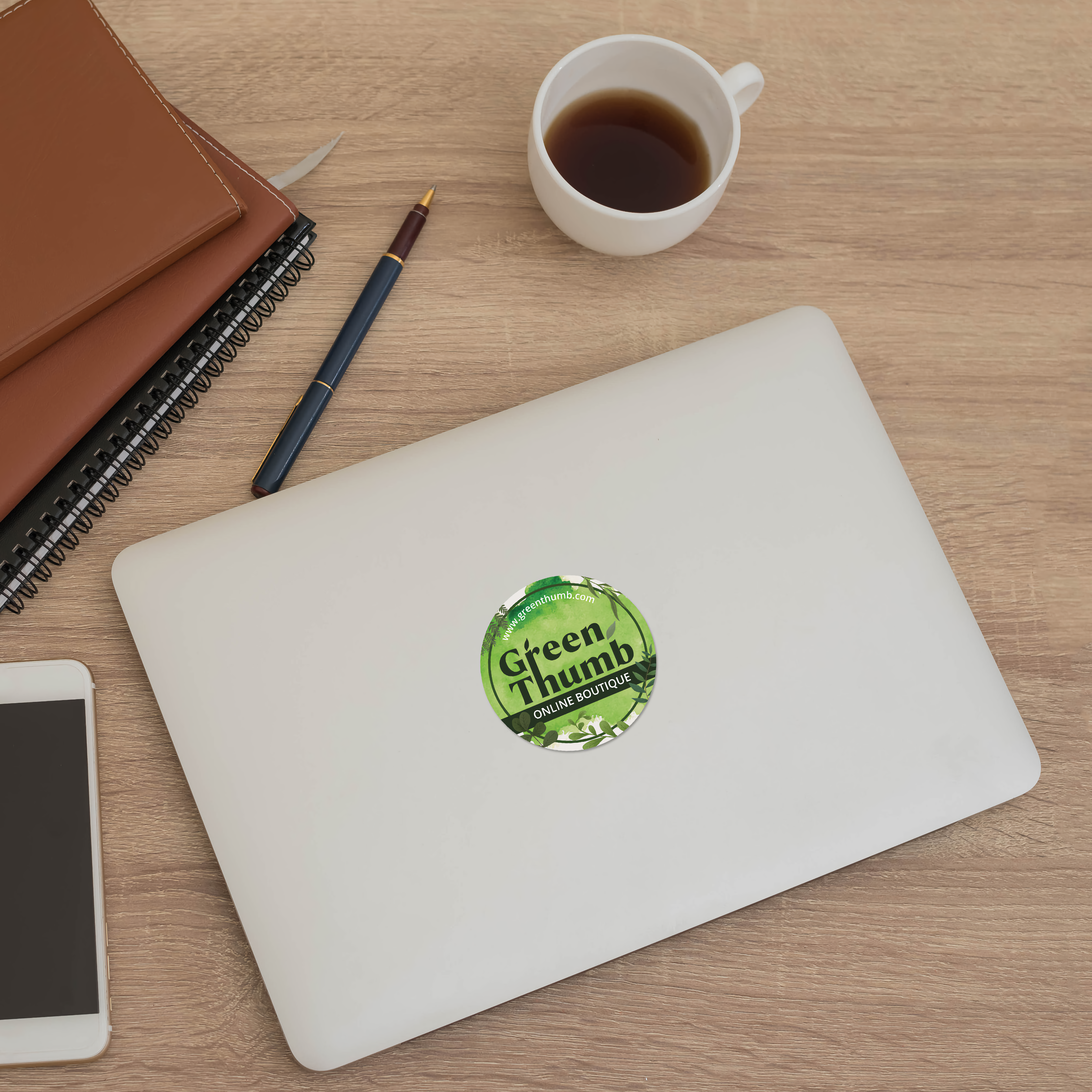 Custom Round Laminated Sticker on Laptop